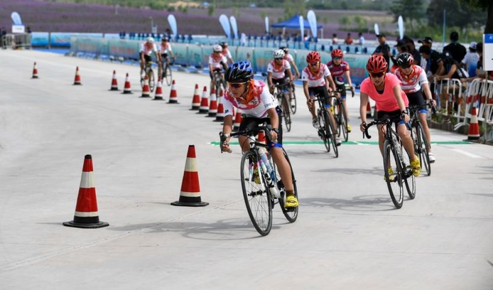 第十六届北京奥运城市体育文化节成长勋章小铁人三项赛举行